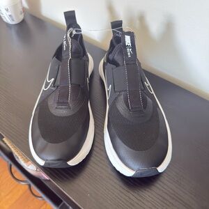 Nike Men’s Black and White Slip-On Sneakers